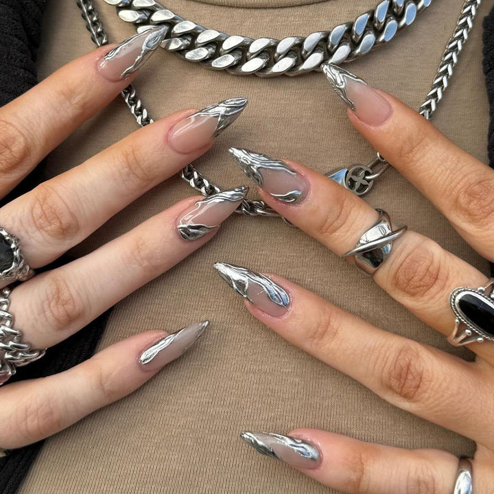 Silver Chrome French Almond Press-On Nails on a hand
