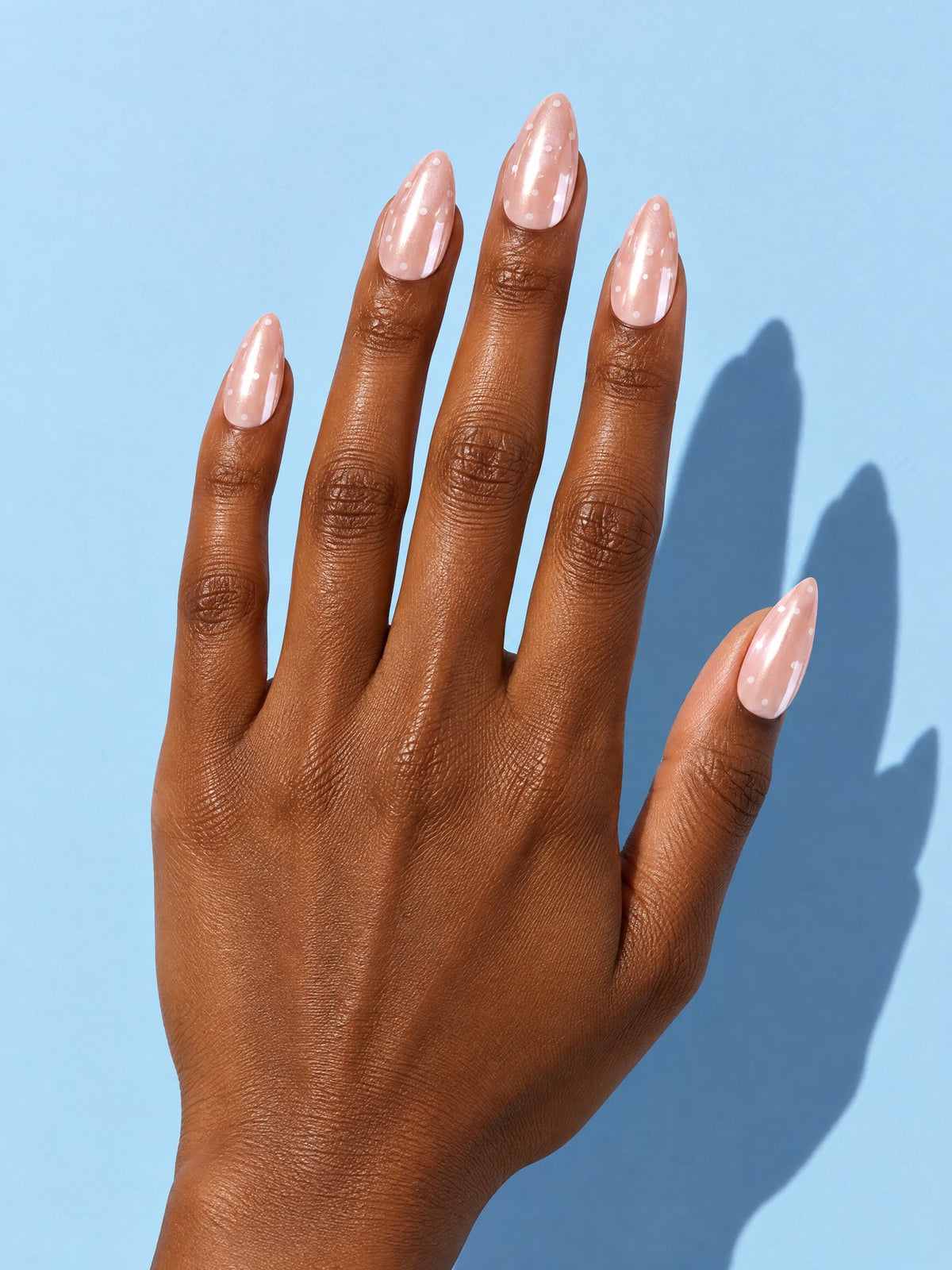 Pearl Glazed Almond Press-On Nails on a hand