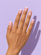 White Swirl French Short Square Press-On Nails on a hand