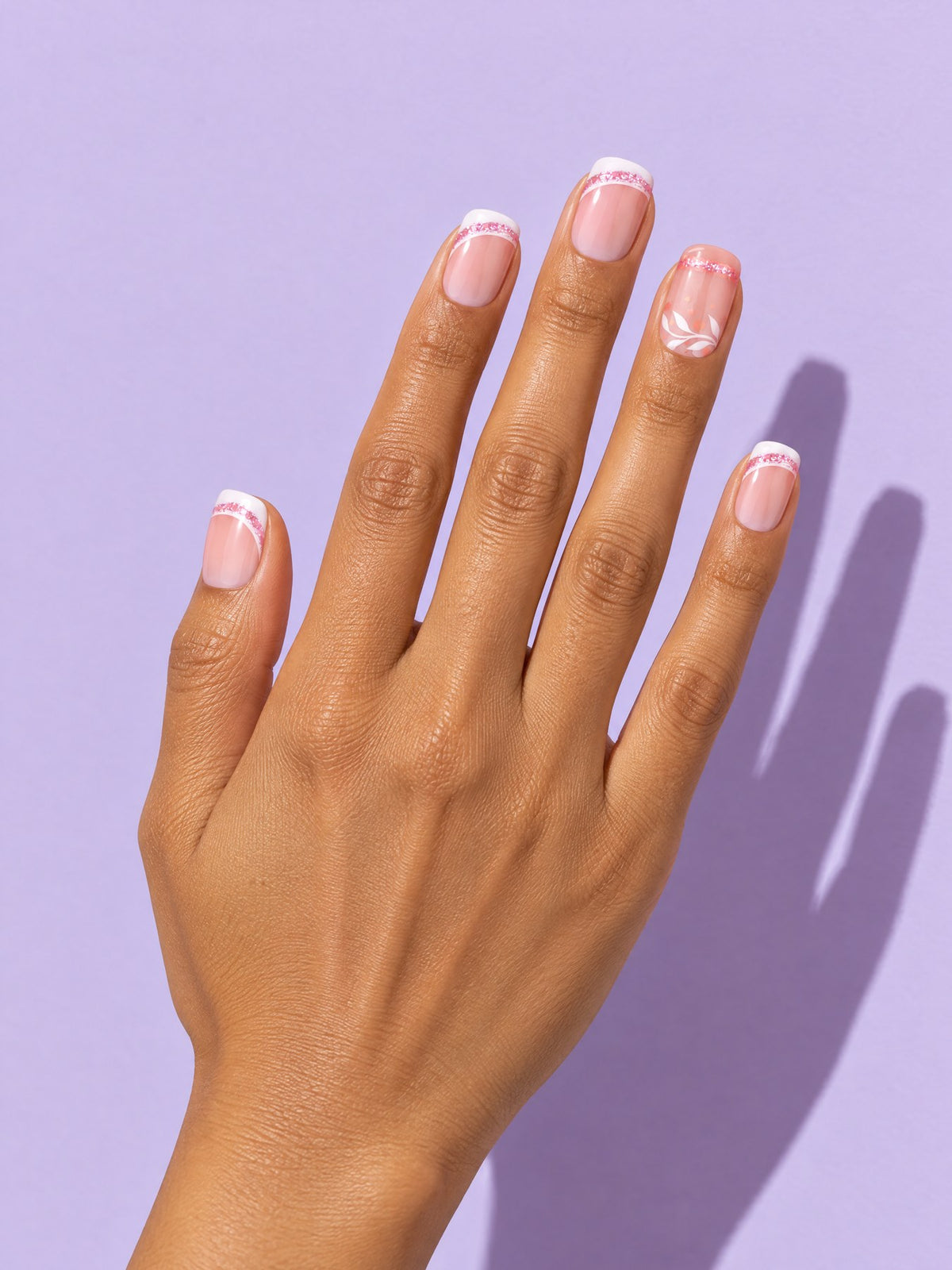 White Swirl French Short Square Press-On Nails on a hand