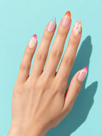 Sunset Floral French Almond Press-On Nails on a hand