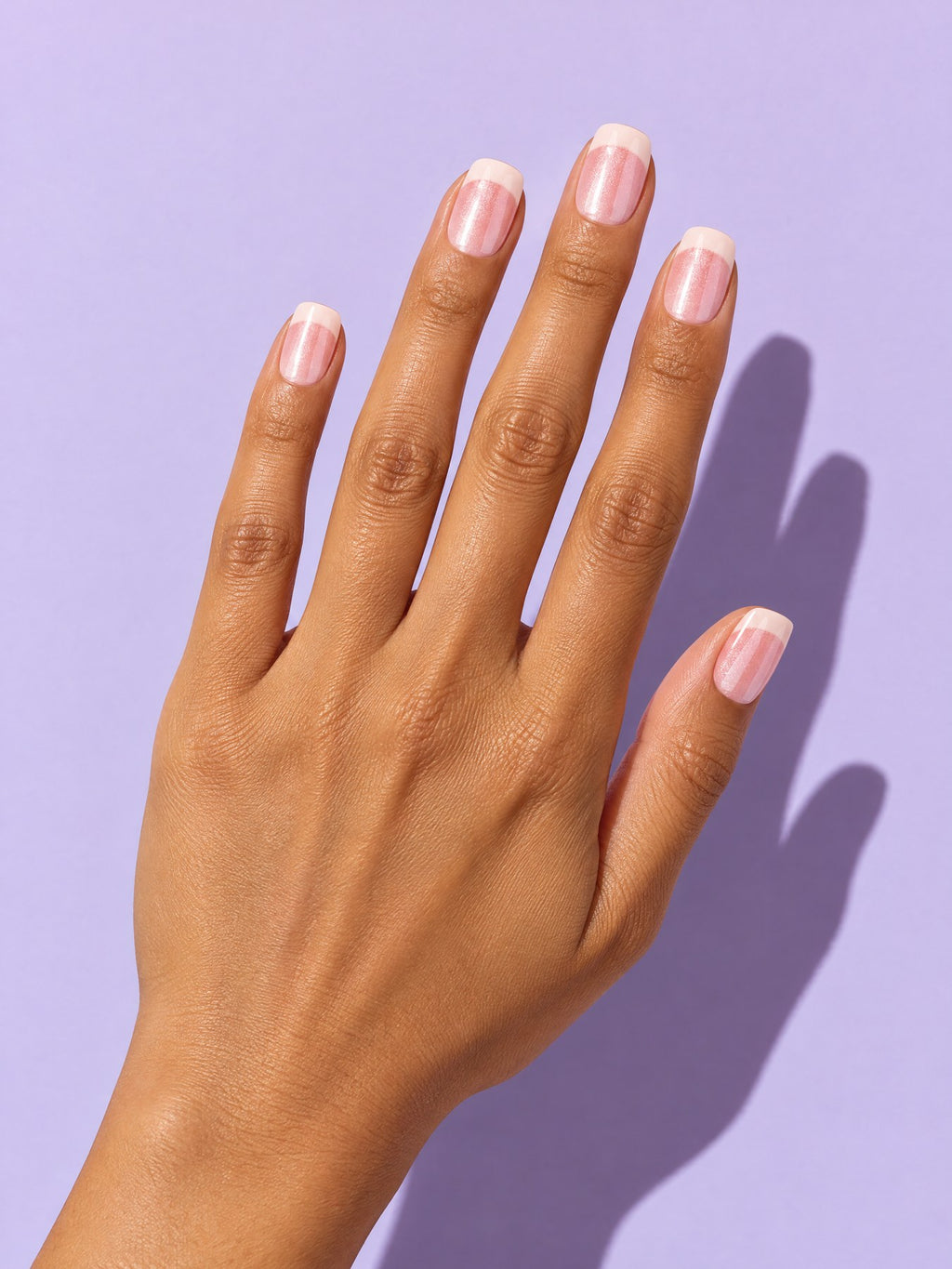 Custard Blush French Short Square Press-On Nails on a hand