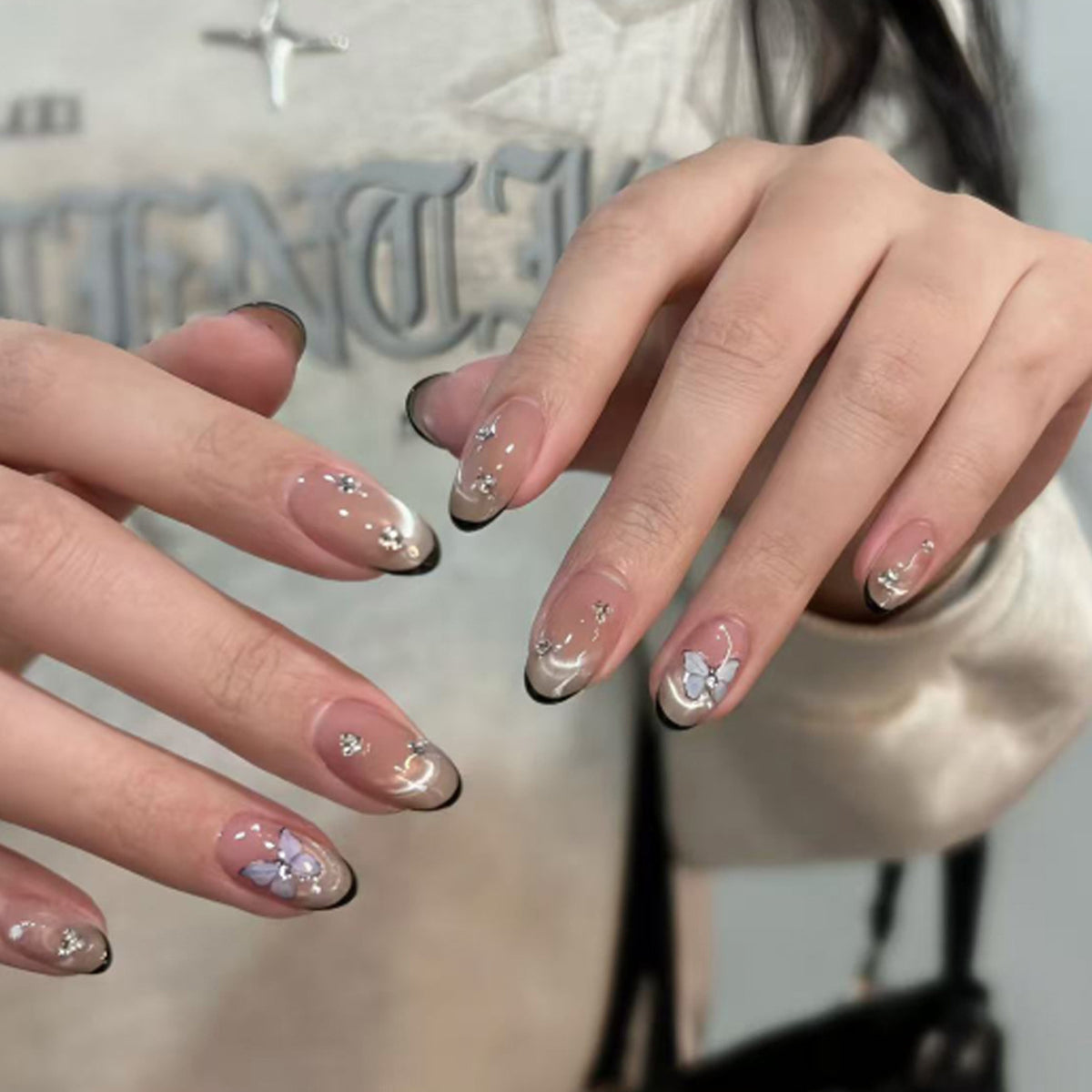 Mocha Butterfly Almond Press-On Nails – mocha with black french tips, crystals and a 3d butterfly, photo 4
