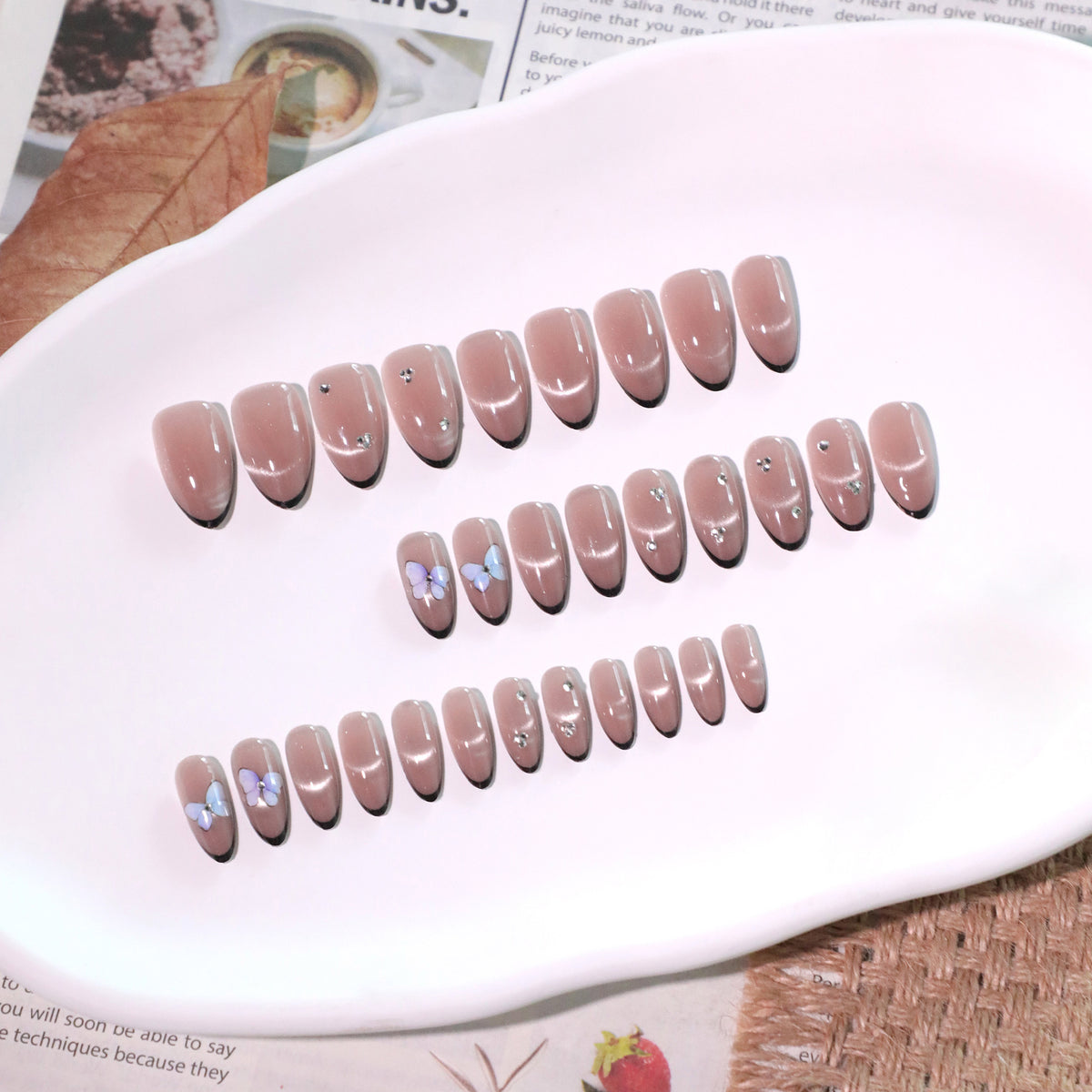 Mocha Butterfly Almond Press-On Nails – mocha with black french tips, crystals and a 3d butterfly, photo 7