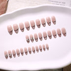 Black Dot French Almond Press-On Nails – nude with black polka-dot french tips and tiny bows, photo 7