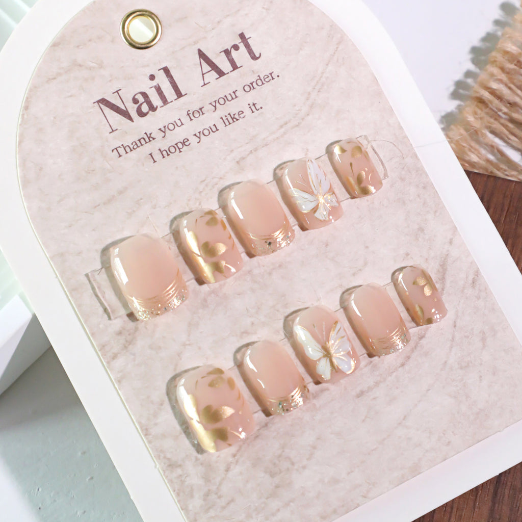Golden Blossom Short Square Press-On Nails – peachy nude with gold-foil petals and glitter tips, photo 5