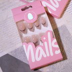 Black Dot French Almond Press-On Nails – nude with black polka-dot french tips and tiny bows, photo 6