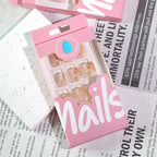 Golden Blossom Short Square Press-On Nails – peachy nude with gold-foil petals and glitter tips, photo 6