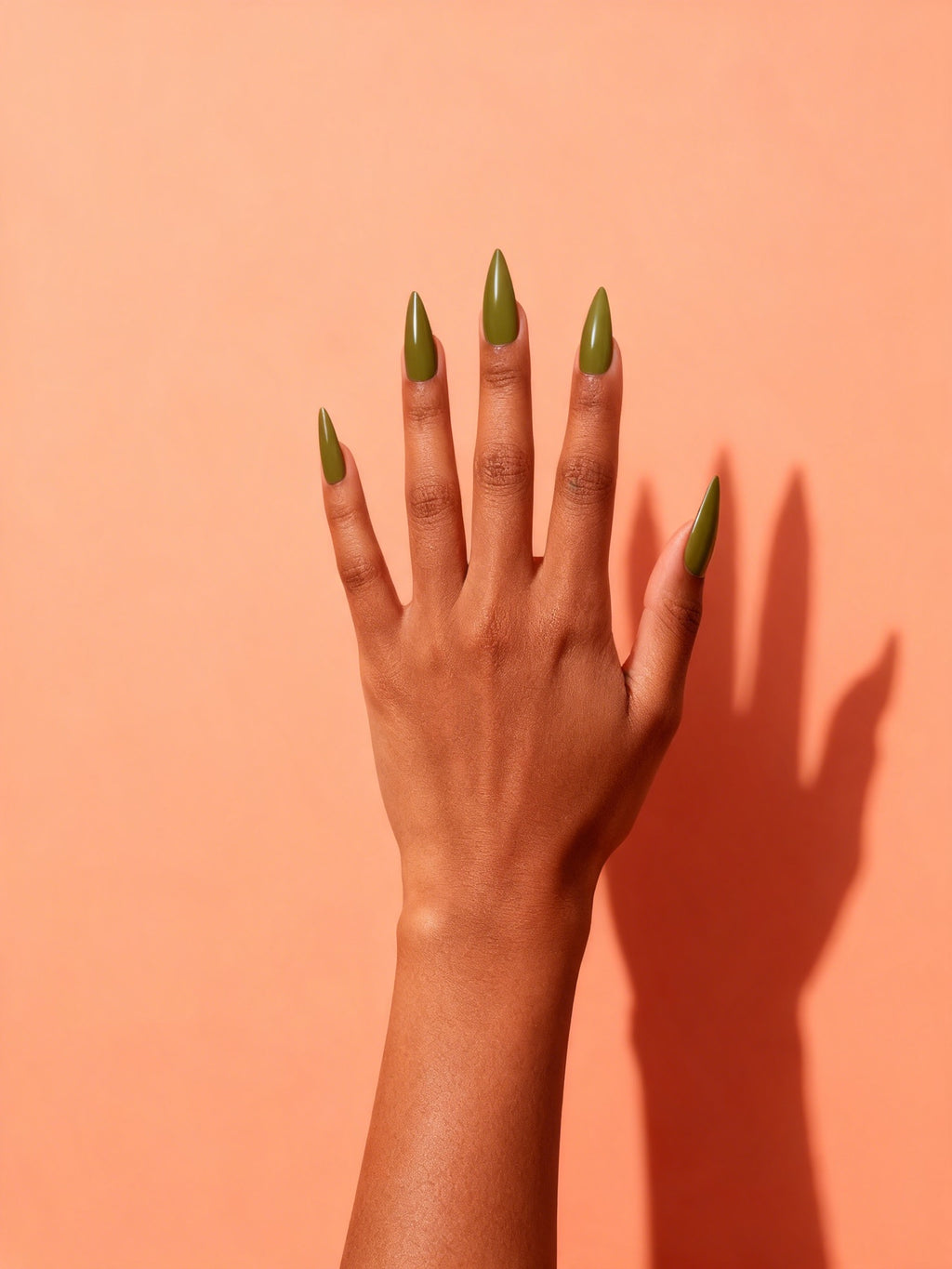 Olive Green press-on nails on a hand