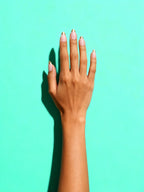 Gold-Tip French Almond Press-On Nails on a hand