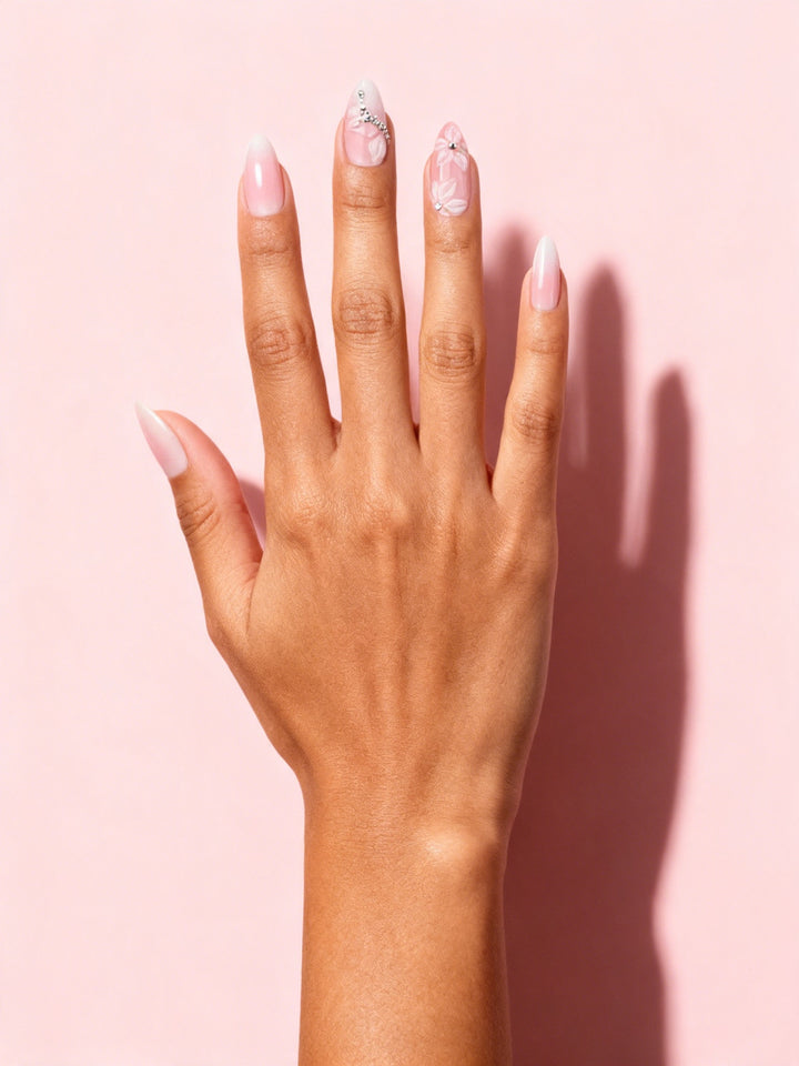 Rhinestone Blossom Almond Press-On Nails on a hand