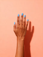 Sky Blue press-on nails on a hand