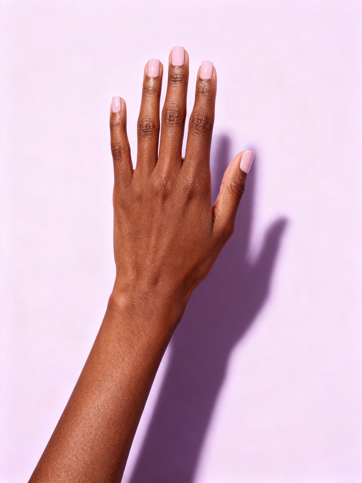 Baby Pink press-on nails on a hand