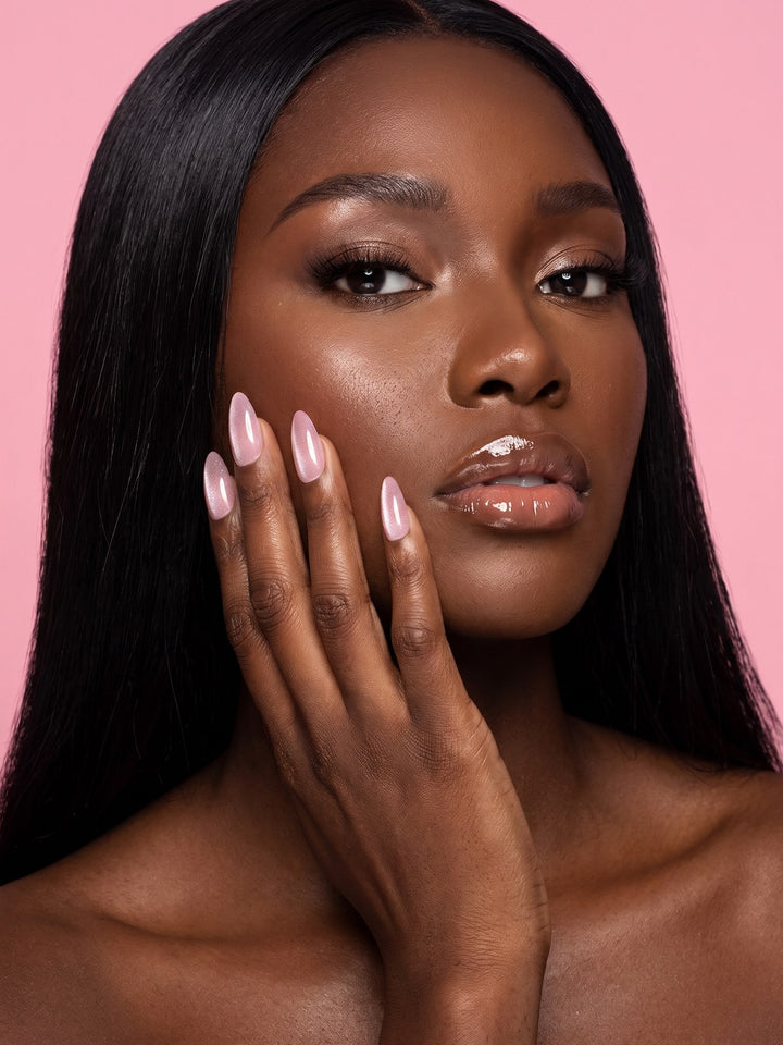 Pink Shimmer Almond Press-On Nails — model wearing the nails