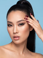 Red Chrome Stiletto Press-On Nails — model wearing the nails