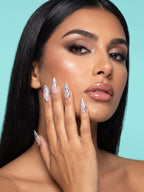 Silver Chrome French Almond Press-On Nails — model wearing the nails