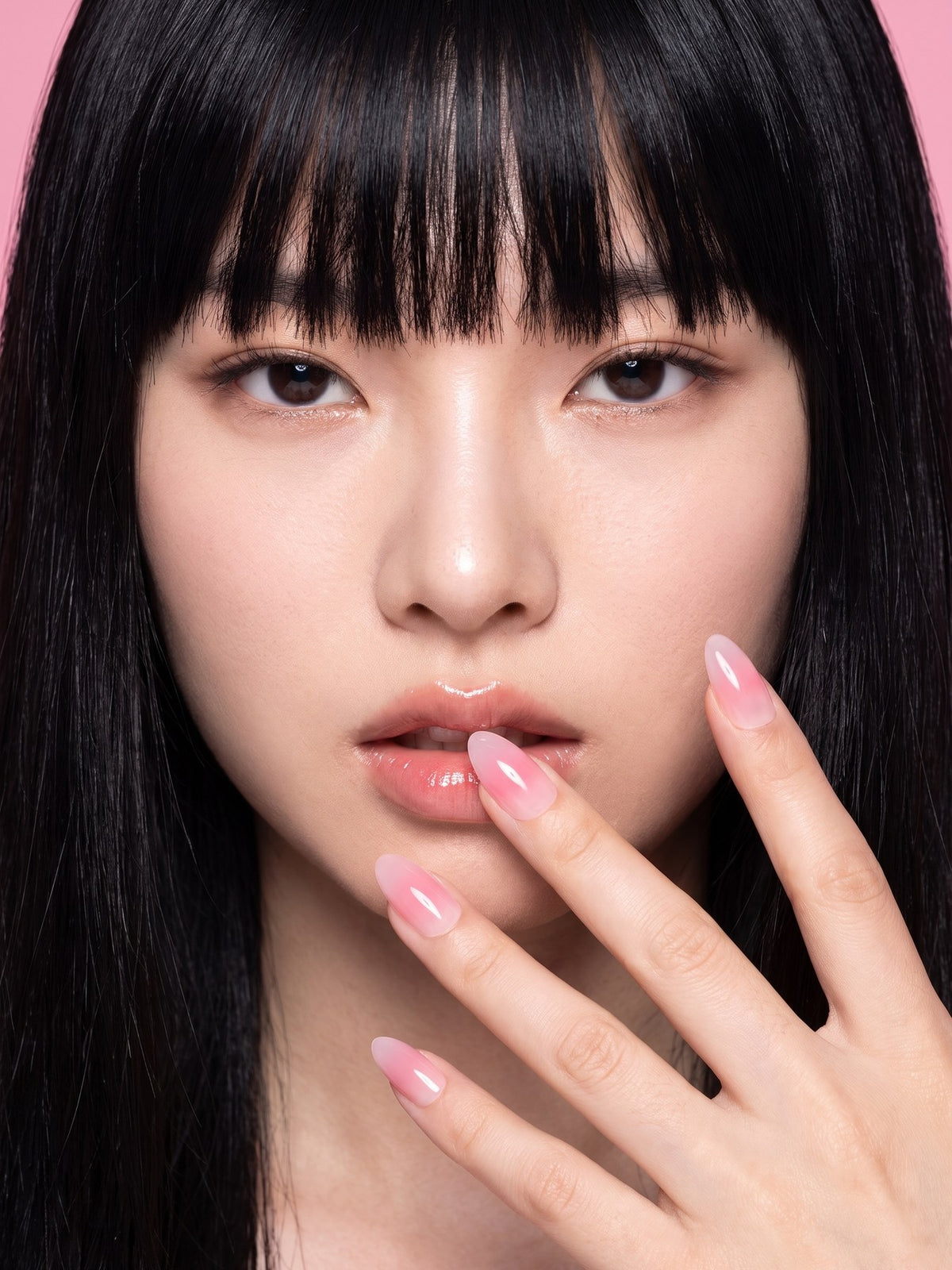 Blush Gradient Almond Press-On Nails — model wearing the nails