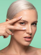 Polka Dot Blush French Almond Press-On Nails — model wearing the nails