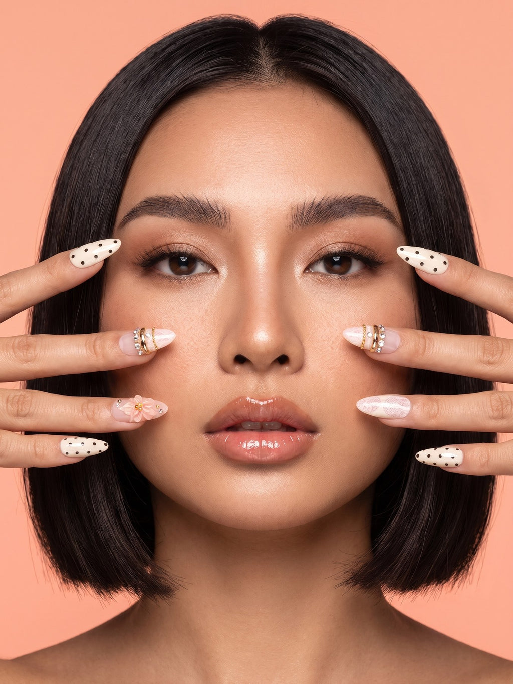 Polka Dot Bow & Blossom Almond Press-On Nails — model wearing the nails