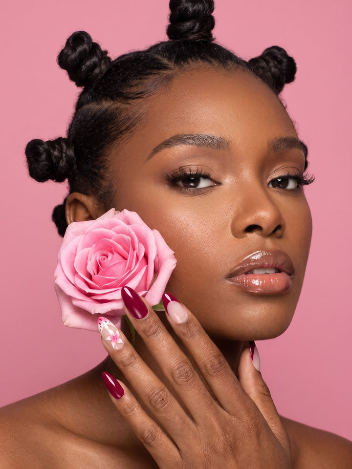 Burgundy Floral French Almond Press-On Nails — model wearing the nails