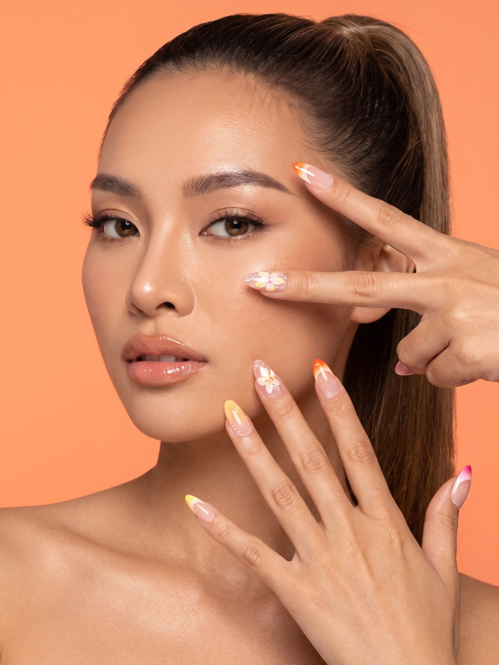 Sunset Floral French Almond Press-On Nails — model wearing the nails